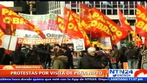 Decenas de personas protestan a las afueras de la Casa Rosa durante visita de Peña Nieto a Argentina