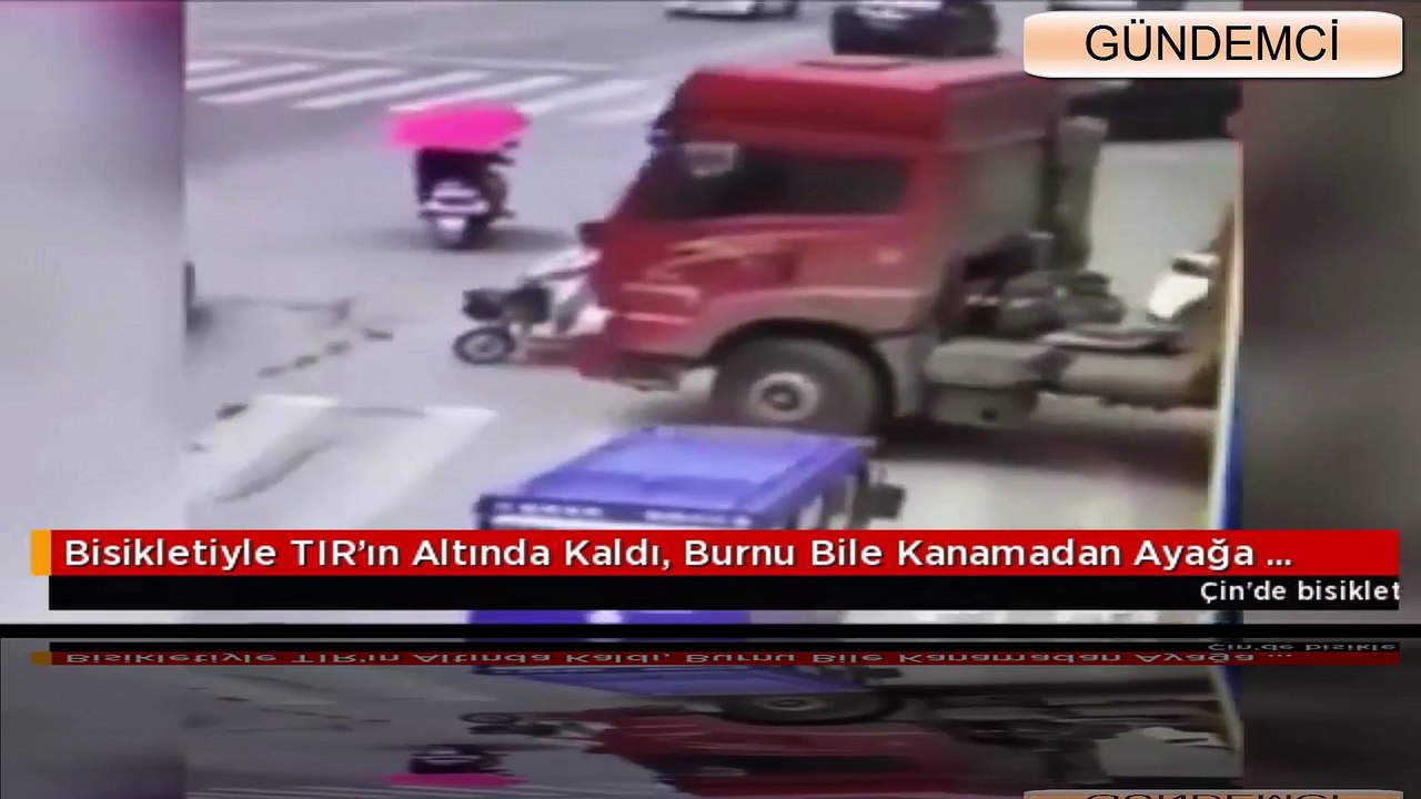 Bisikletiyle TIR’ın Altında Kaldı, Burnu Bile Kanamadan Ayağa Kalktı