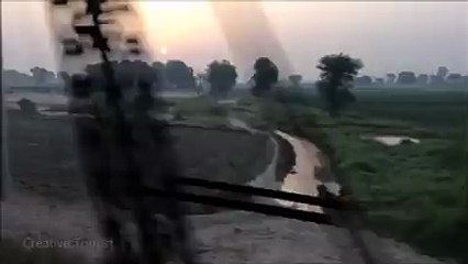 Beautiful sunrise view from train crossing River Ravi