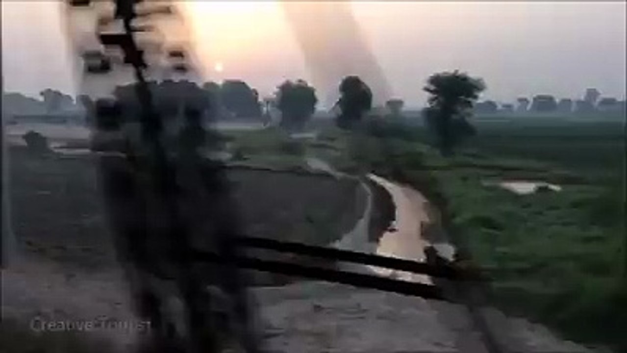 Beautiful sunrise view from train crossing River Ravi