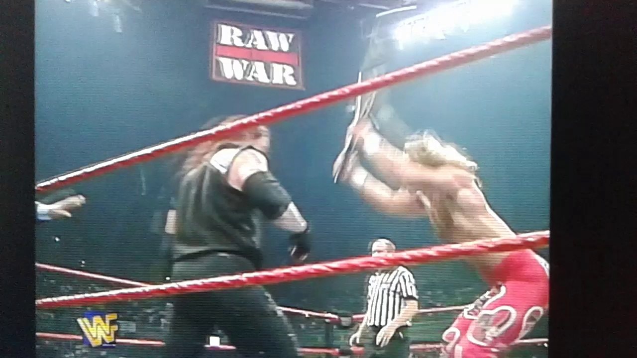 Shawn Michaels Destroys Undertaker With A Steel Chair