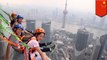 Glass skywalk 340m above ground: China unveils new Shanghai Jin-Mao tower walkway - TomoNews