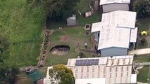 Sinkhole swallows part of Ipswich backyard; abandoned mine may be to blame - ABC News Australian Broadcasting Corporation-2