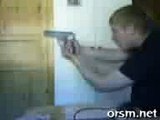 FAIL - Stupid Kid nearly kills himself accidently with a gun