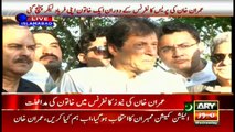 Imran Khan leaves abruptly after woman interrupts press conference