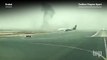Smoke billows from Emirates airliner after crash landing in Dubai