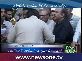 Woman disrupts PTI press conference, forces Imran to leave