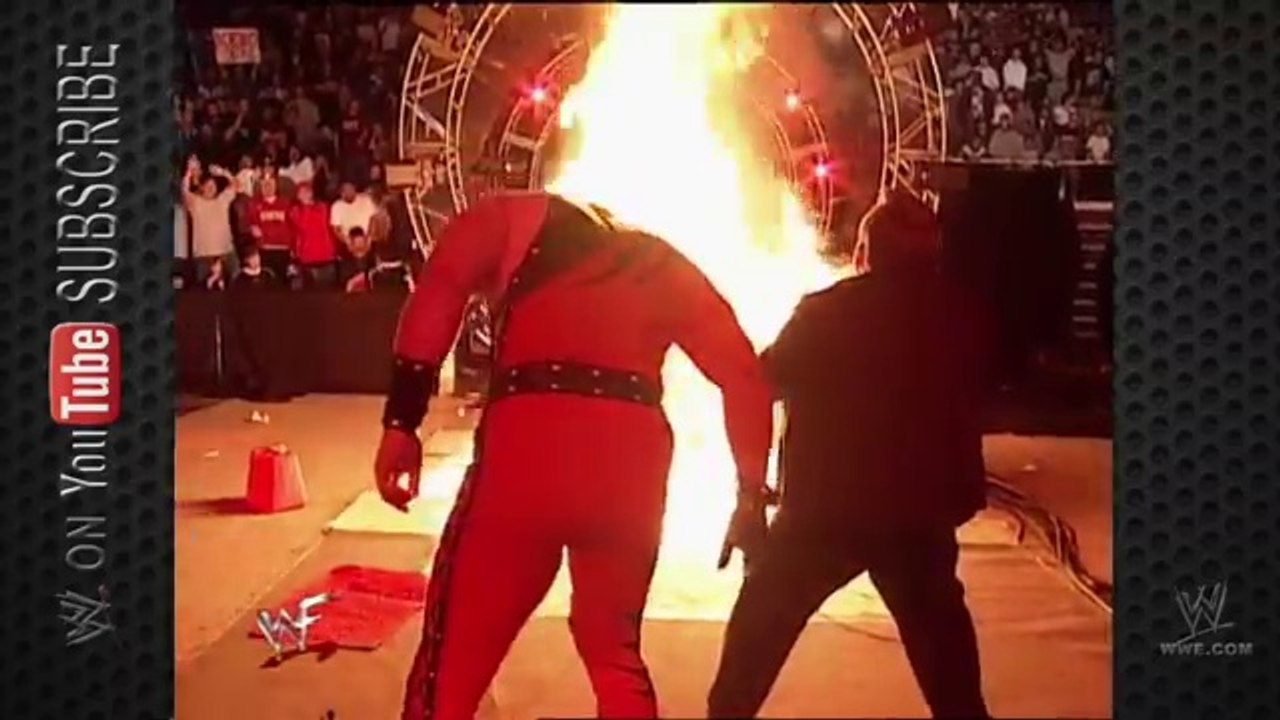 Kane burns The Undertaker
