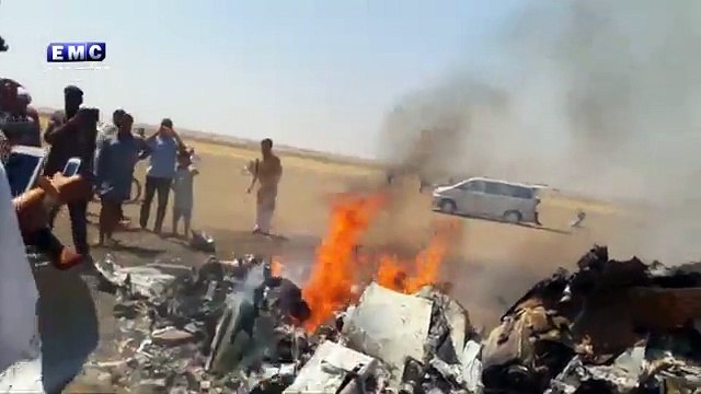 Helicopter delivering AID is seen dropping 'chemical weapons' on a Syrian...