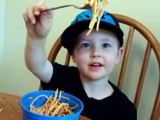 Funny baby eating spaghetti!!!