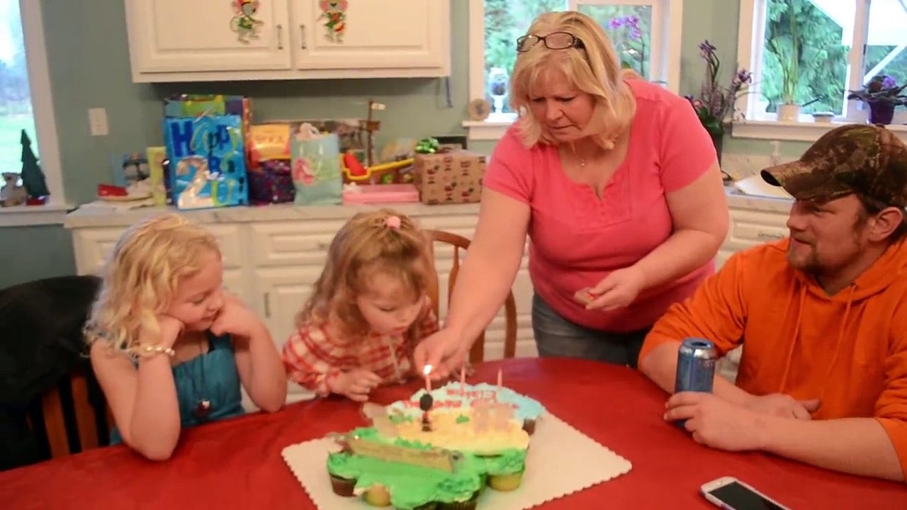 Adorable Girl Can't Resist Blowing Out Candles