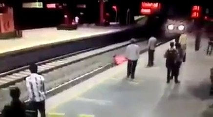 Girl Jumps On Rail Track just few moments before train Arrive | OMG |