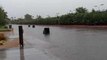 Trash Cans Float Away in Phoenix Flooding