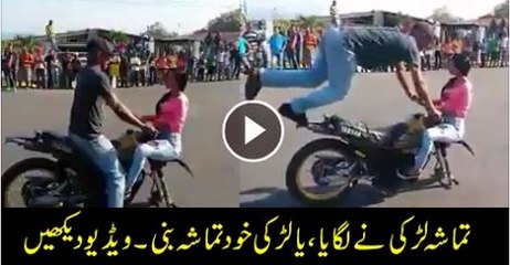 women drive bike at road