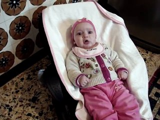funny baby speaking, in her own language