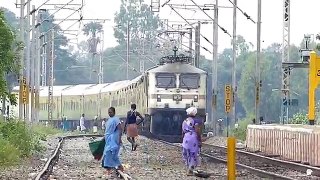 Woman ALMOST gets Hit by TRAIN - Indian Railways