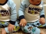 Twins baby boy talk in their sign language