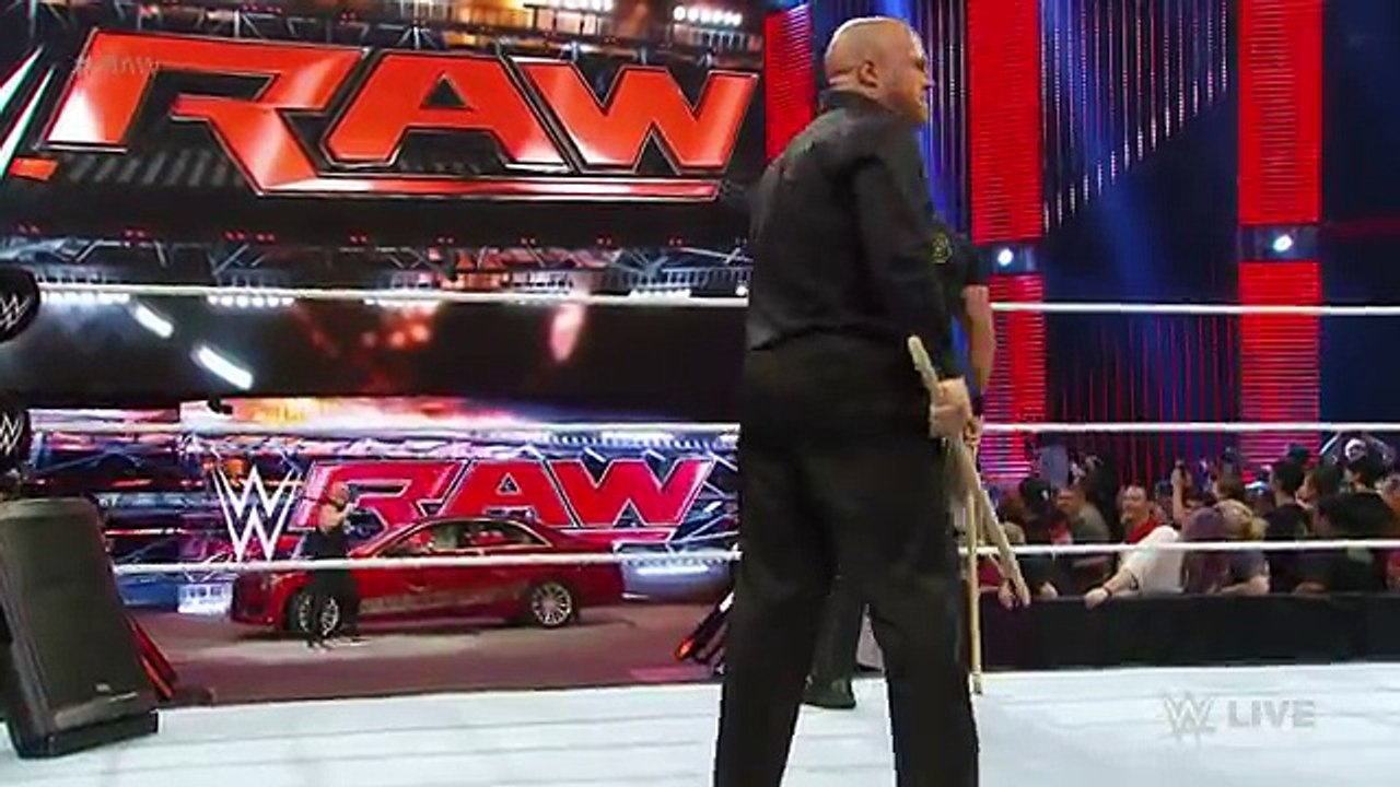Brock Lesnar destroys J&J Security's prized Cadillac- Raw, July 6, 2015[by ShareTV]