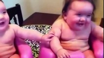 Twins baby laughing and crying