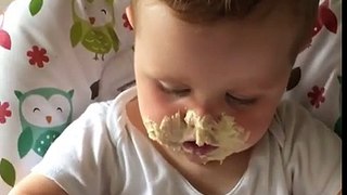 Valentino eating hummus