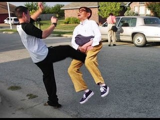 AGAIN BUT IS THAT A GIRL KICKING BALLS :o