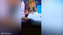 Becky Adlington caught stroking Mark Foster's leg under table