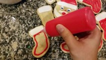 Frosting sugar cookies with royal icing