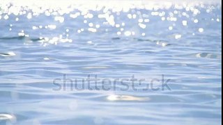 Sparkling Fresh Wavy Water Is Shining On A Sunny Summer Day In Slow Motion, Abstract Blurry Backgrou