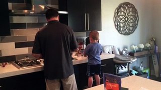 Fletcher helping dad make supper. Summer 2016