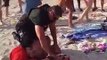 Policier VS deux hommes sur la plage (Floride) - Costaud le mec