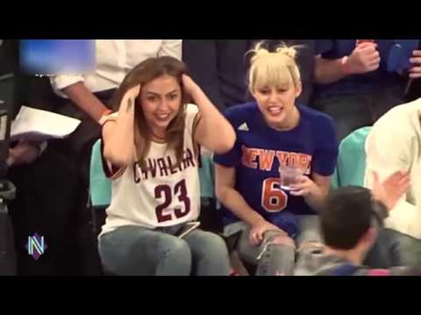 Miley Cyrus jokes with sister courtside at New York Knicks game