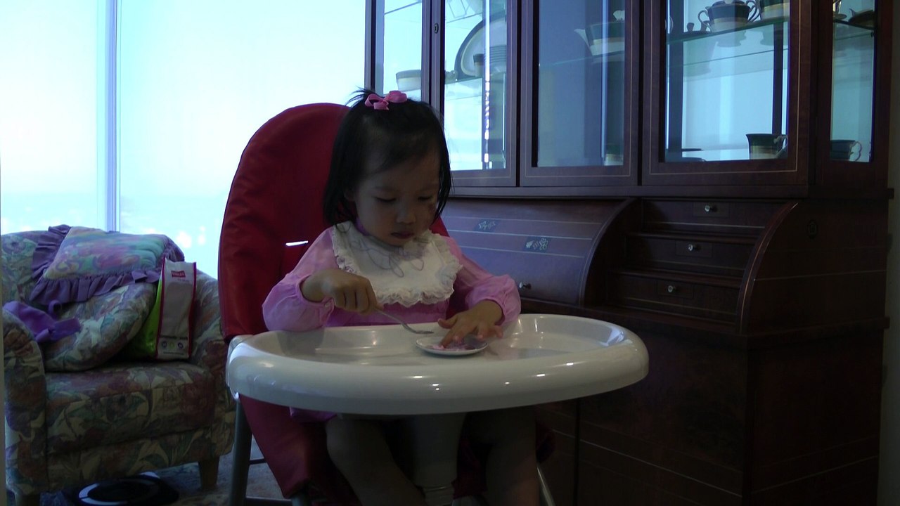 Girl Eating Her Pink Rose*