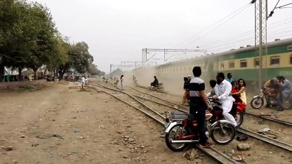 What happened when two man with bikes stuck on train track