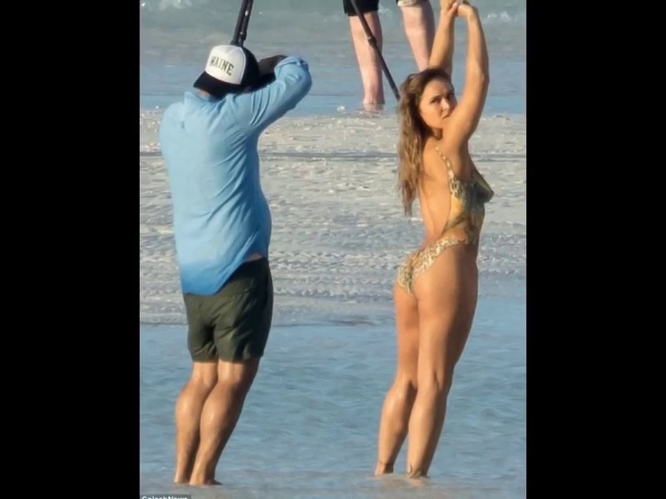 Ronda Rousey poses naked in painted-on bathing suit for Sports Illustrated shoot