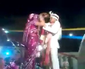 Bride Falls From Stage While Trying Something Stupid