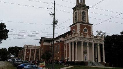 DR YORK  AT THE POOR FOOD LINE IN AT ATLANTA