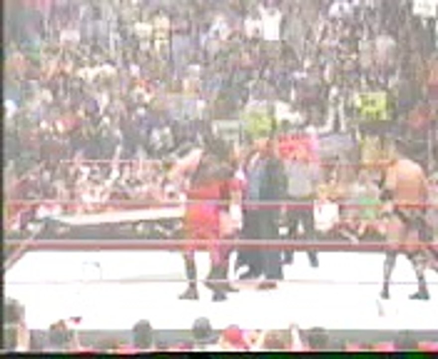 WWE - Undertaker and Kane BOTH chokeslam HHH through a table