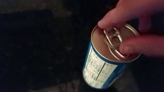 Opening a can of pineapple juice