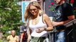 Rita Ora showing off her enviable figure oozes style in plunging bodysuit