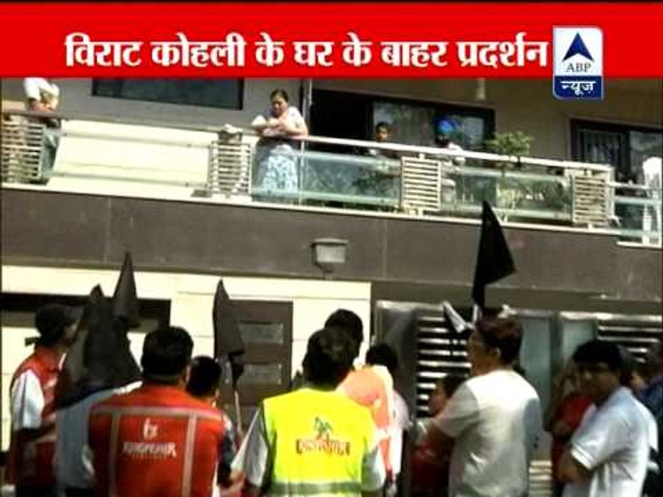 Kingfisher airlines employees protest outside of Kohli's home