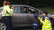 Ireland's Youngest Policeman Takes Names at Checkpoint