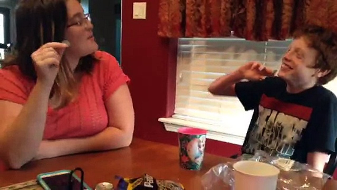 My mom and brother trying Finnish candy