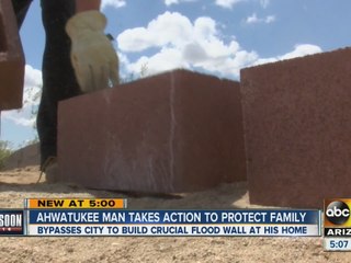 Ahwatukee man building his own flood wall