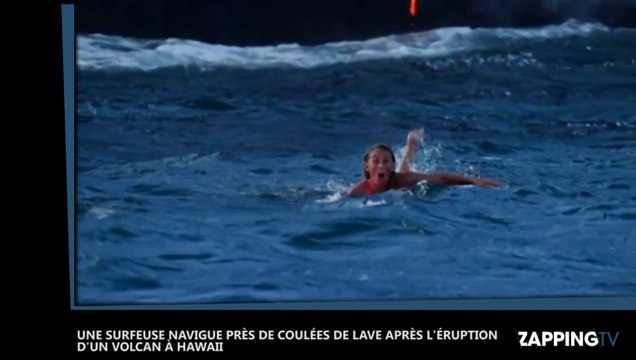Elle fait du surf près de coulées de lave d’un volcan en éruption à Hawaii