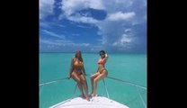 Kylie Jenner - Sexy Body Poses in a Red Swimsuit_(320x240)