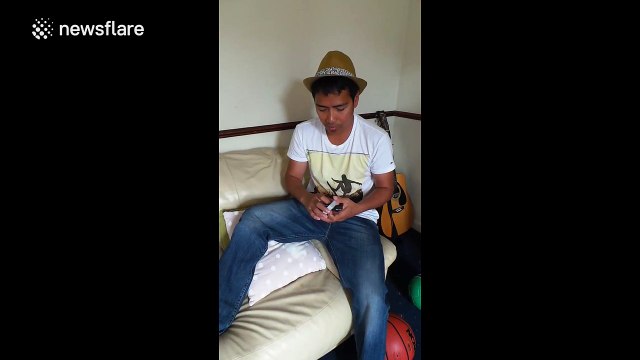 Magician pulls off cool trick with one single card in mid-air