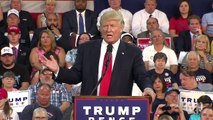 Trump asks crowd 'who likes the snake?' before reading poem about immigration