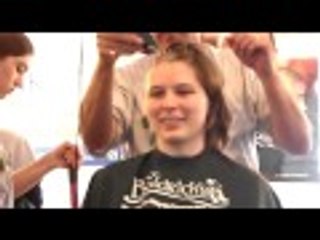 Young girl headshave for St.Baldrick's