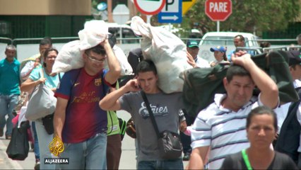 Thousands cross over as Venezuela-Colombia border reopens