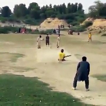 Brave boy playing cricket with paralyzed legs
